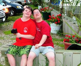 Two athletes taking a photo